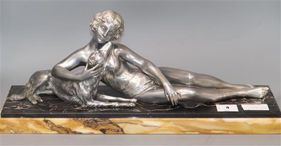 A French Art Deco silvered metal group of a girl with borzoi, after Le Bruns length 55cm